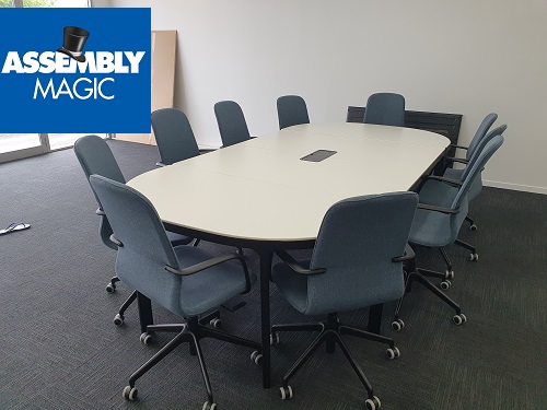 a conference room package. Assembly Magic logo in top left corner