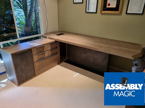 High-end office furniture assembly with Assembly Magic logo in bottom right corner