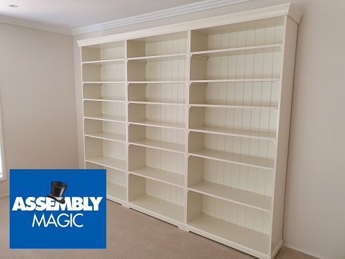 Large shelving unit with Assembly Magic logo in bottom left corner