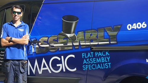 technician - Shaun, next to his Assembly Magic vehicle