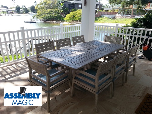 Outdoor furniture setting by Assembly Magic. Assembly Magic logo in bottom left corner