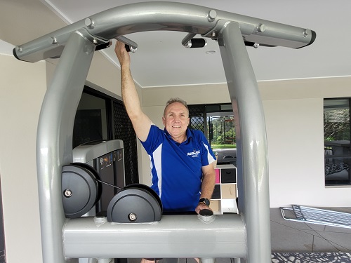 Technician with newly assembly Gym equipment