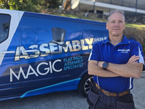 Technician - Robert, next to his van.
