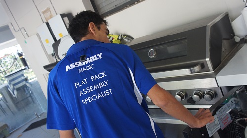 BBQ assembled by Assembly Magic. Logo in bottom right