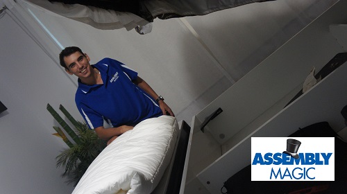Technician - Shaun, with a hydraulic lift bed he assembled