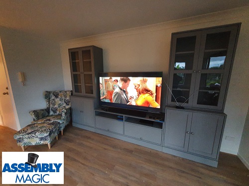 An entire Living room set installed by Assembly Magic. Assembly Magic logo in bottom left corner