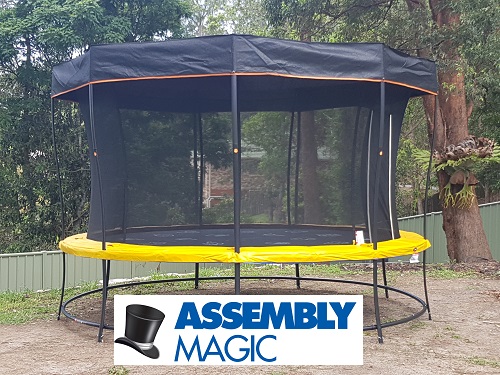 Trampoline with safety net and sunshade - Assembled by Shaun from Assembly Magic.