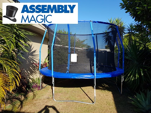 Large trampoline assembled by Assembly Magic. Logo in top left corner