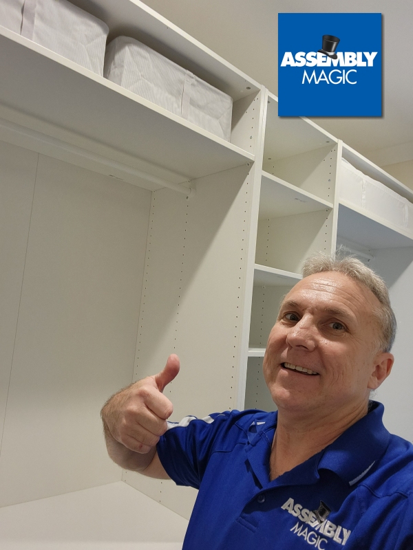 Merv with Walk in Wardrobe thumbs up with Assembly Magic Logo