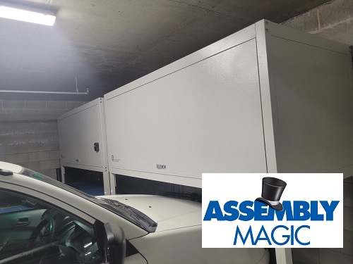 White over bonnet storage with Assembly Magic logo in bottom right corner